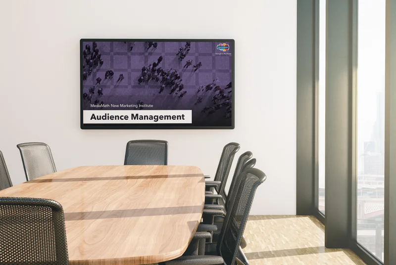 empty conference room with Audience Management slide displayed on screen